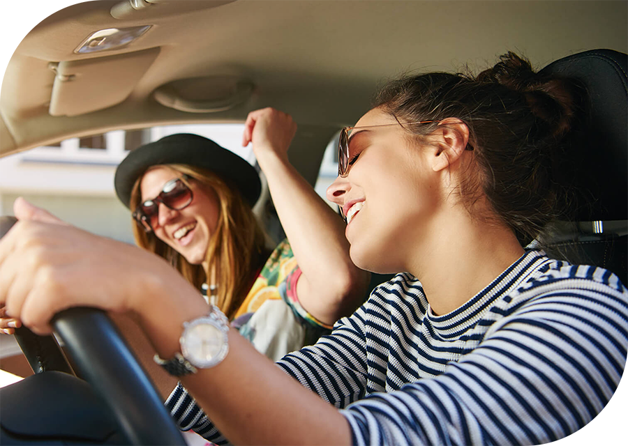 Rounded-Rectangle-Women-in-car@0.5x.png